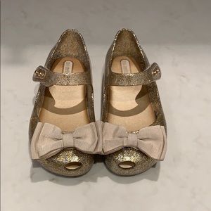 Mini Melissa gold shimmer shoes. Size 9.